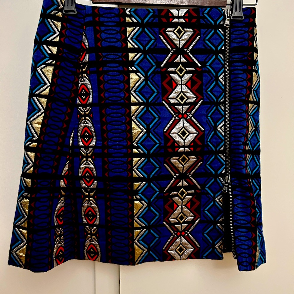 Fun skirt with zipper and gold threading design in an Aztec pattern